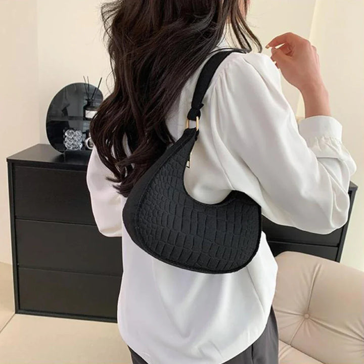 Faux leather bag with rough texture design