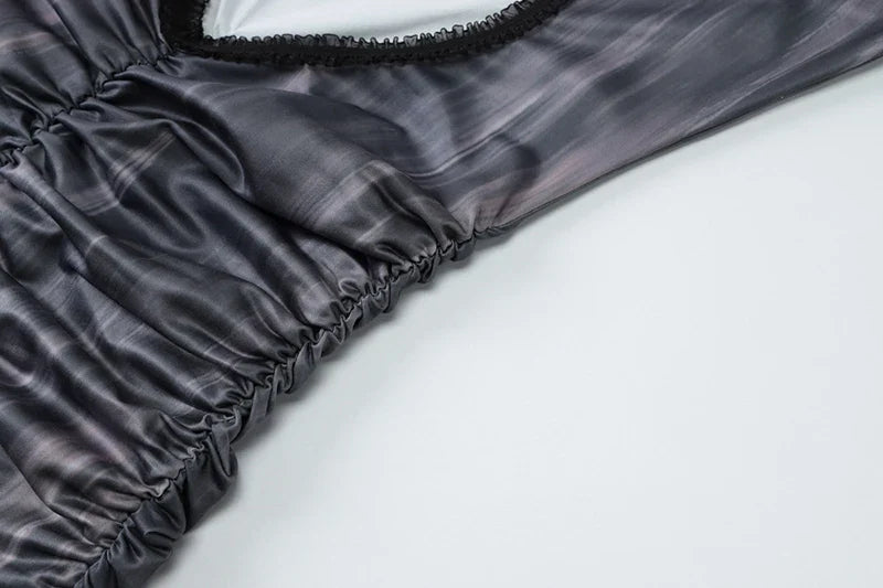 שמלת מיני מלמלה בעיצוב פתח גב פתוח - טייט