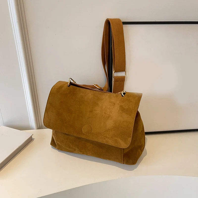 Suede bag with retro design