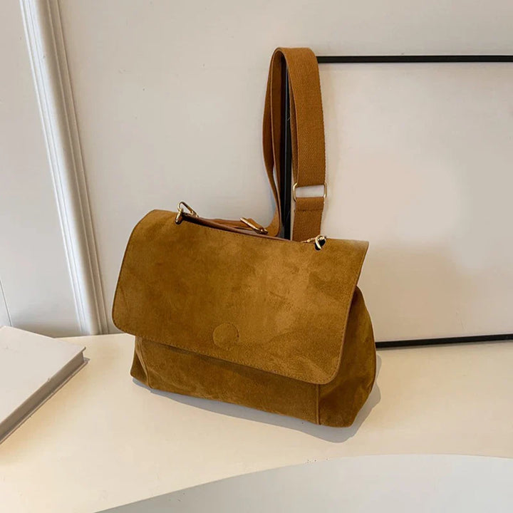 Suede bag with retro design