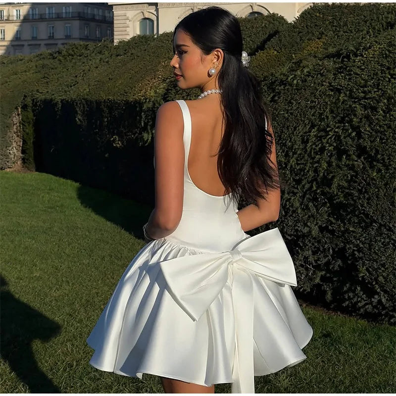 שמלת מיני סאטן גב פתוח בעיטור פפיון  - Reese