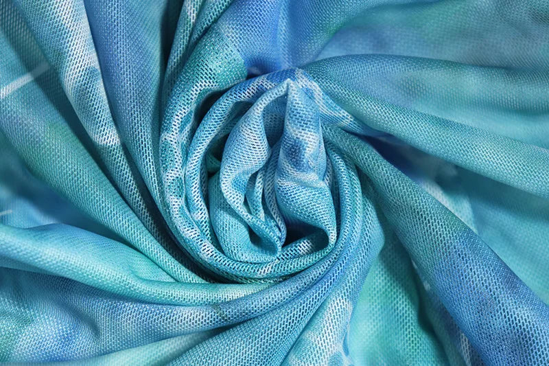 סט שני חלקים בהדפס טרופי טופ וחצאית מקסי מלמלה בעיצוב שסע - MAYA