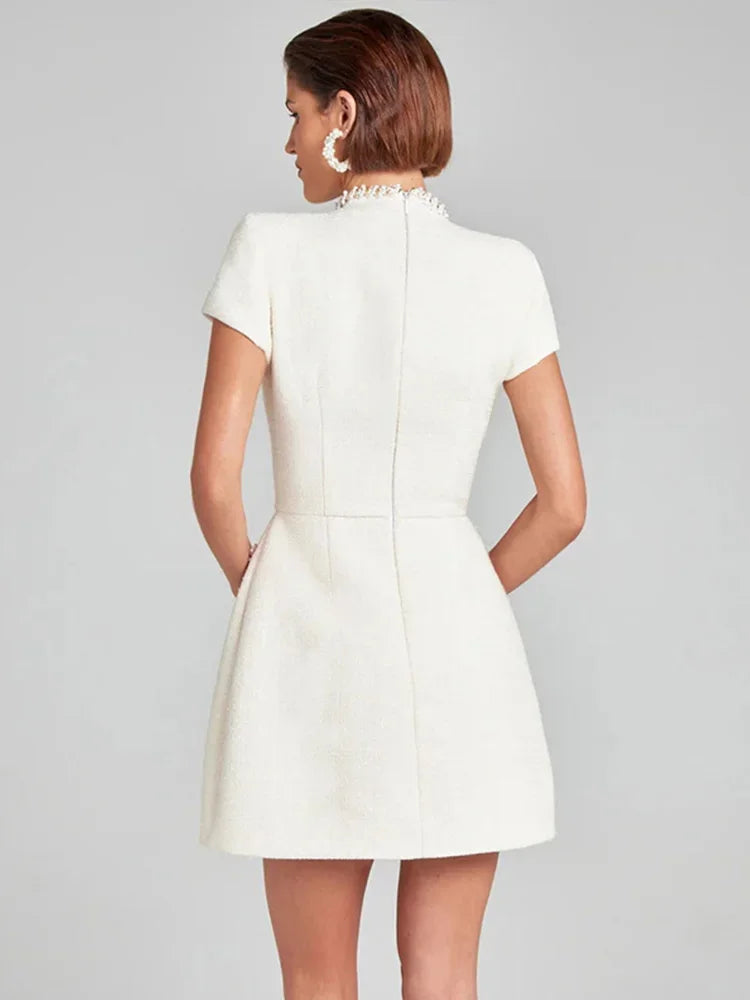 שמלת מיני אלגנטית שרוול קצר/ארוך סגנון מחויט בד ארוג בעיטור נצנצים ופנינים - Lucia