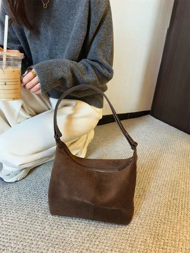 Suede bag with classic design