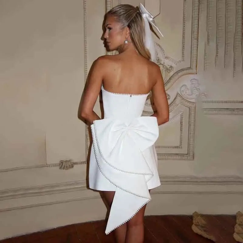 שמלת מיני סטרפלס בעיטור פפיון ופנינים - מארין