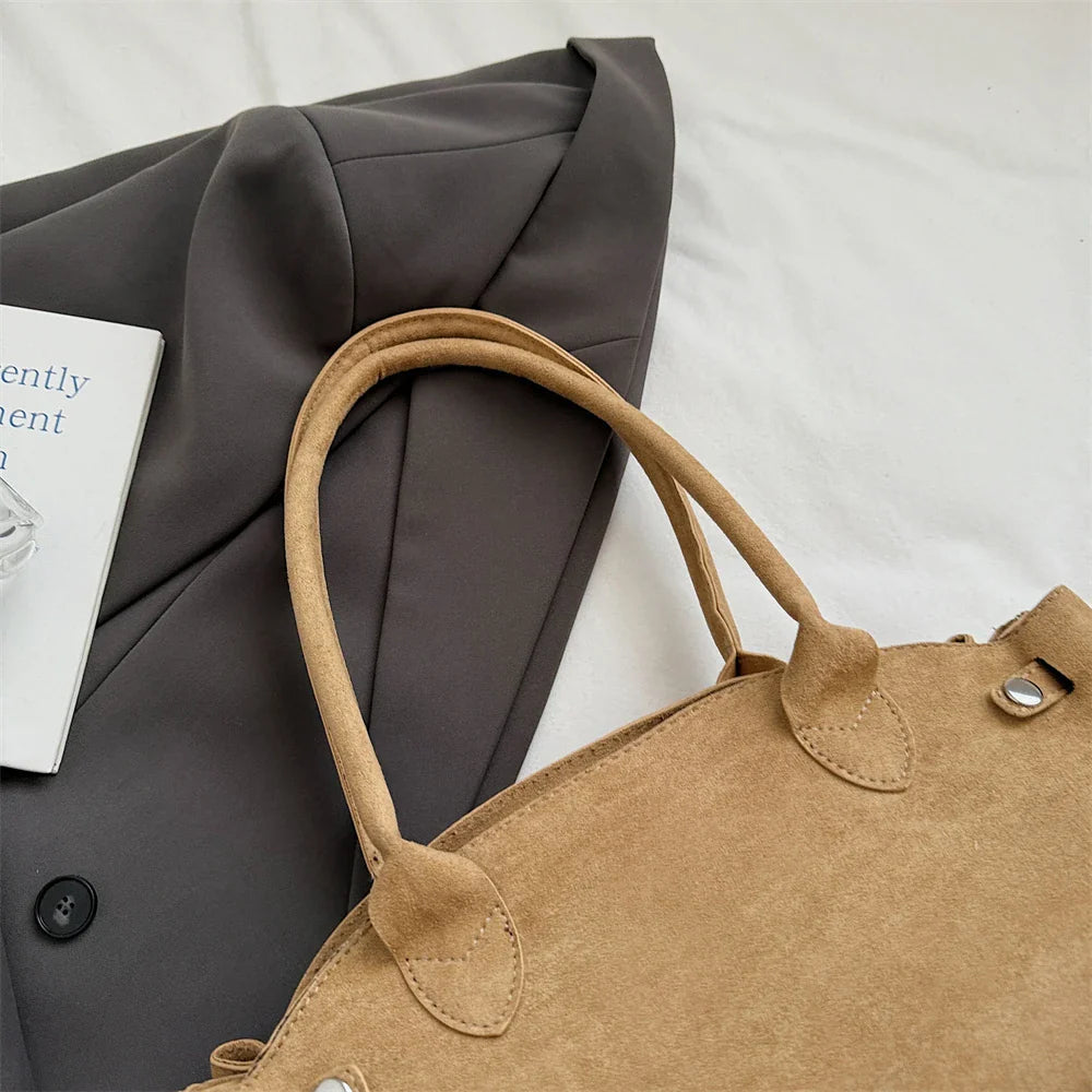 Suede bag with retro design