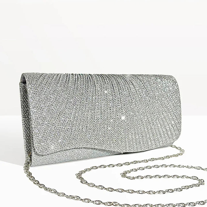 Clutch bag with sparkling studs and chain strap design
