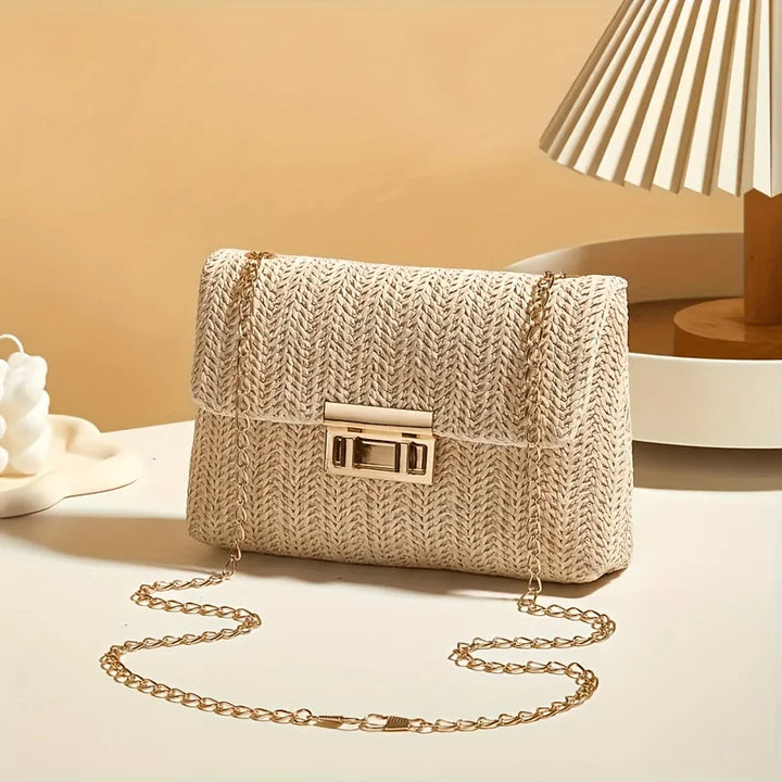 Small straw bag with chain strap design