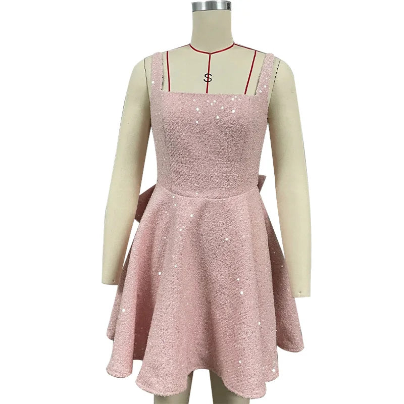 שמלת מיני פייטים בגזרת A בעיטור פפיון בגב - Alayna