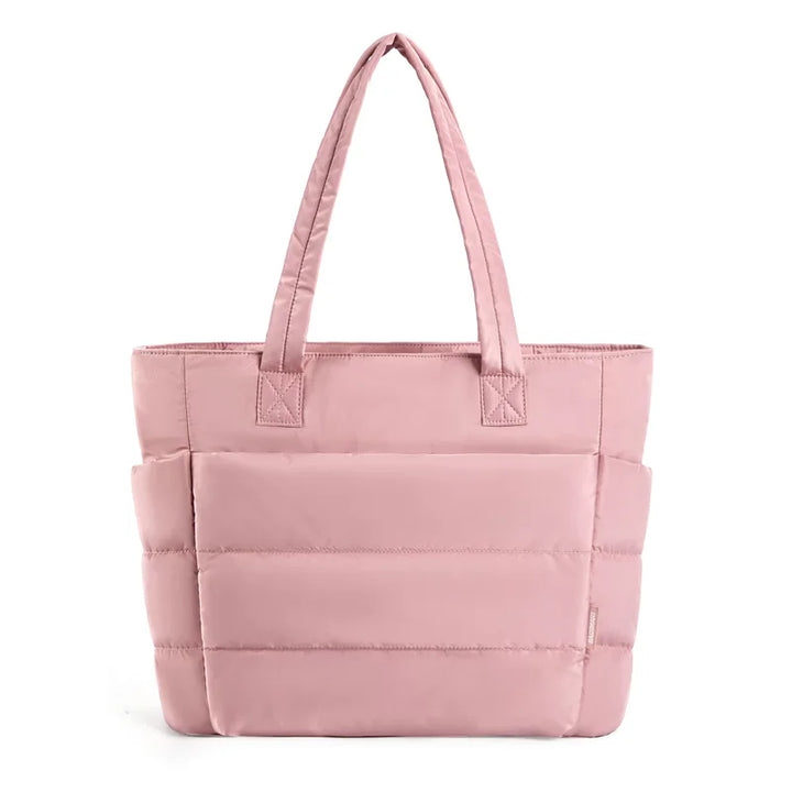 Padded carrying bag with large storage compartment