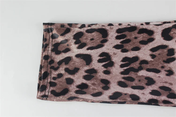 אוברול מנומר צמוד בעיצוב רשת בצדי המותן - Alexis