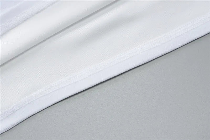 סט שני חלקים חצאית מיני כיווצים בעיטור שובל וחולצת רשת בעיצוב כיווצים - בריטני