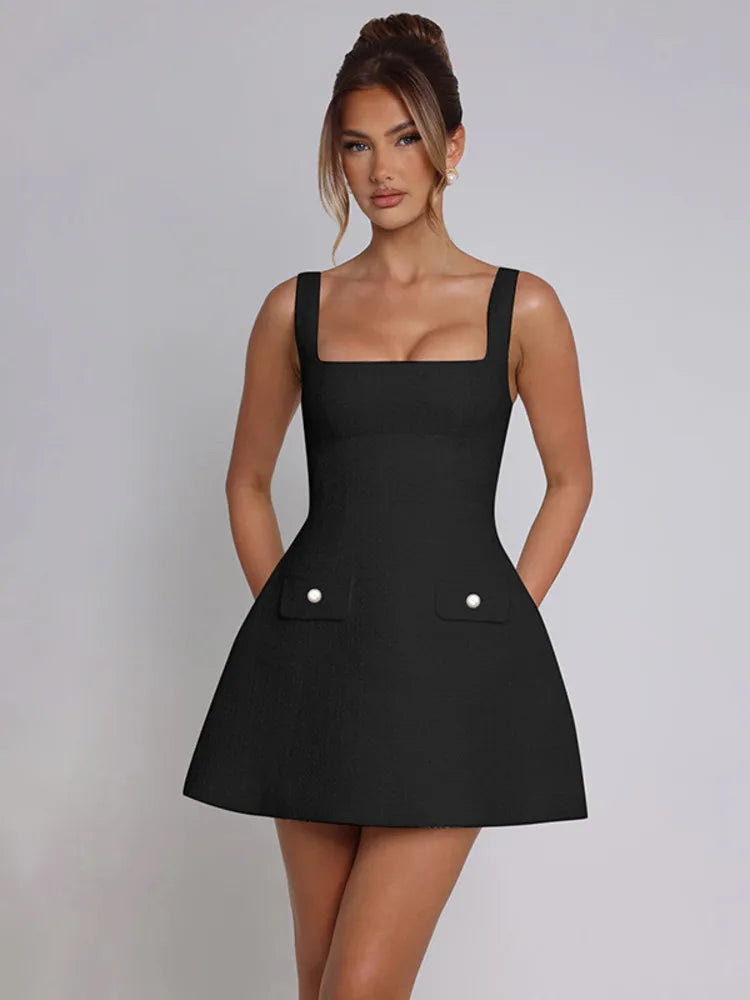 שמלת מיני בד ארוג בגזרת A בעיטור כיסים - מילי