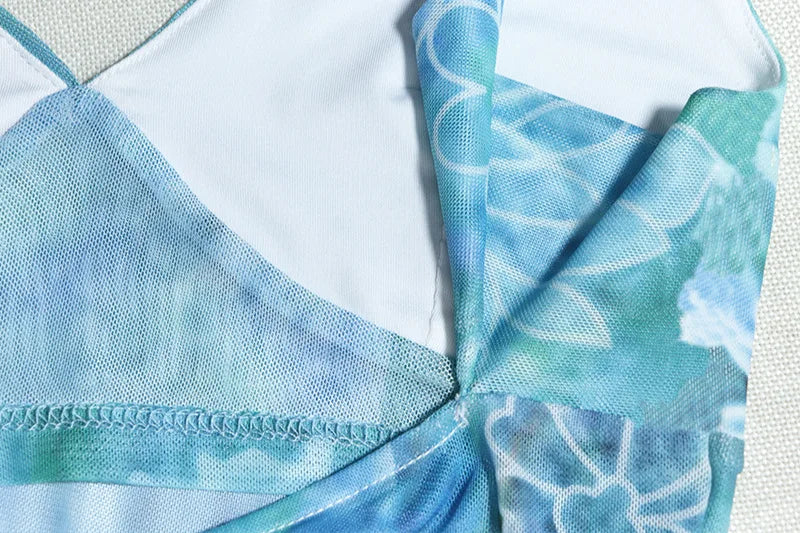 סט שני חלקים בהדפס טרופי טופ וחצאית מקסי מלמלה בעיצוב שסע - MAYA