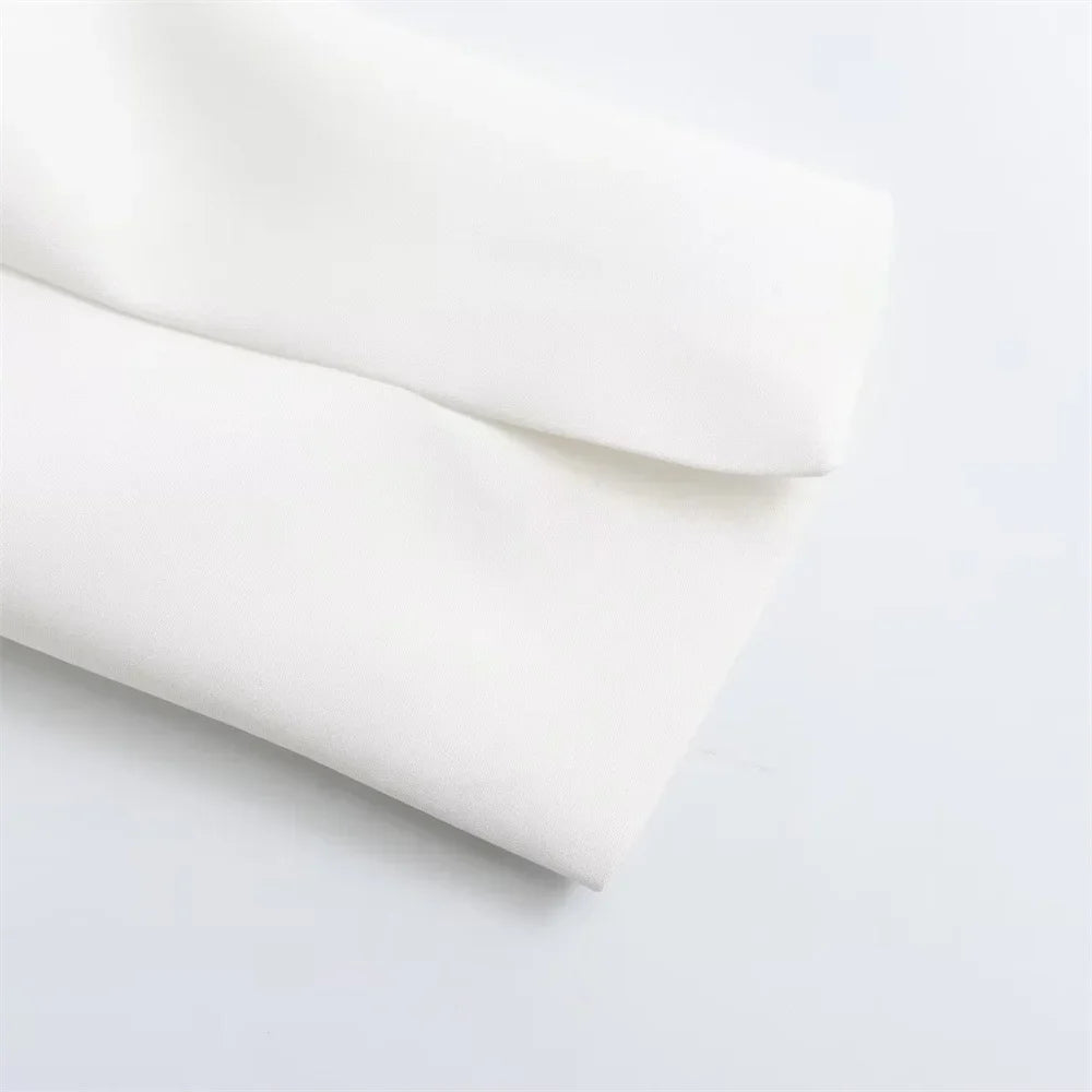 שמלת מיני מחויטת בעיצוב פתחים וחגורה בגב - דבי