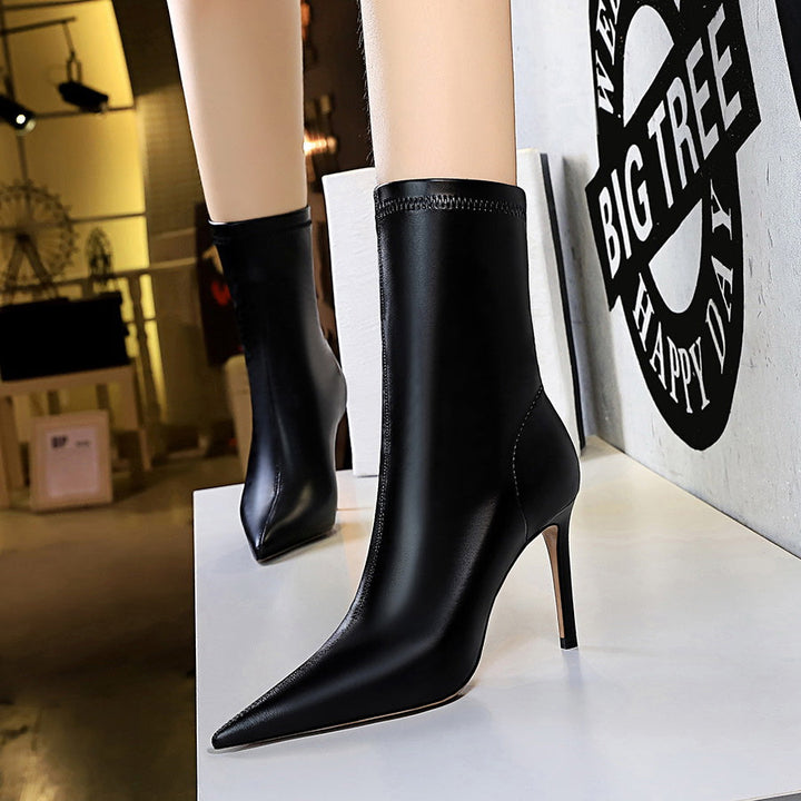 Faux leather heeled boots with warm fur lining - DORI