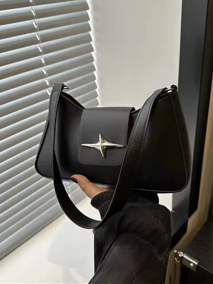 Faux leather bag with buckle design